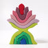 Colorful wooden toy with stacked rings on a white background