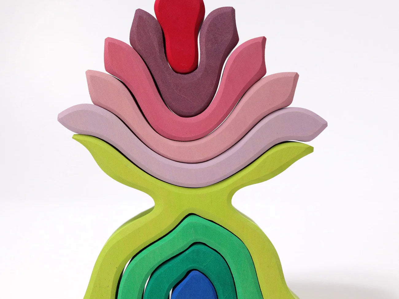 Colorful wooden toy with stacked rings on a white background