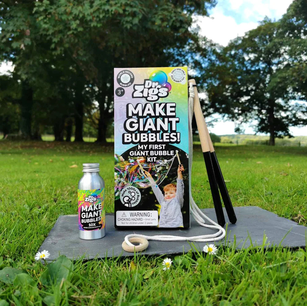Dr. Zigs bubble kit with bottle and wand on grass